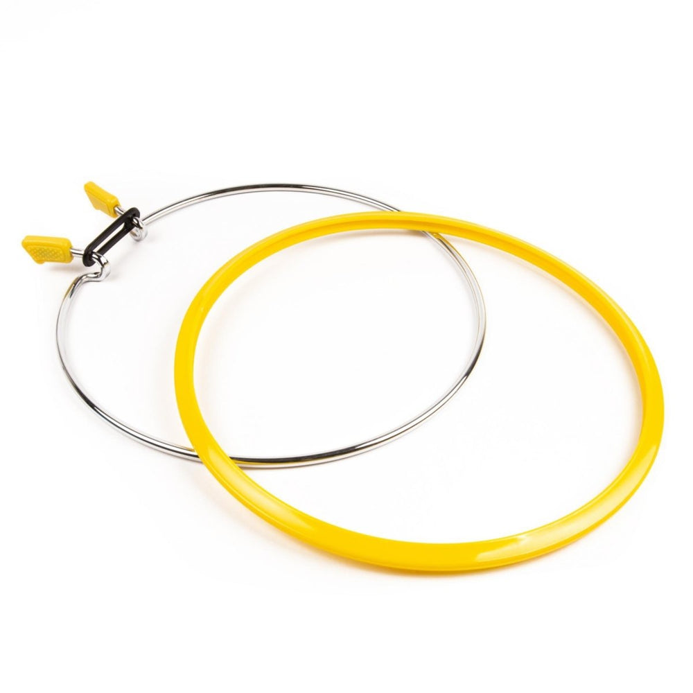 Adjustable spring tension embroidery hoop for sewing, Nurge brand.