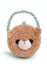 Círculo Amigurumi Pelúcia – Polyester Chenille Yarn (131 m / 85 g) - A small crocheted teddy bear face handbag with a mint green braided handle, featuring a light brown textured body, black bead eyes, and a white plush nose on a white background.