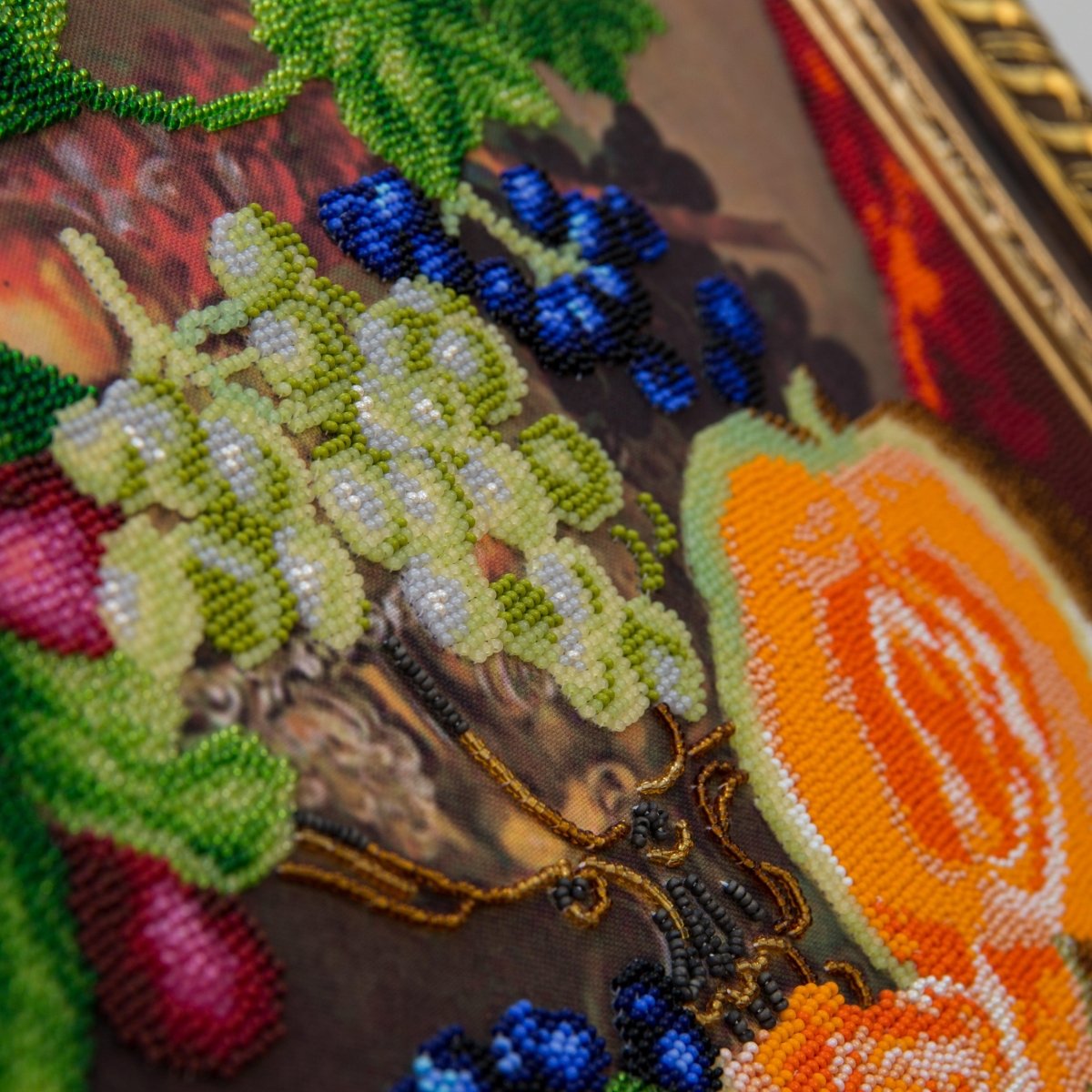 Handcraft kit showcasing a beaded still life with a pumpkin centerpiece.
