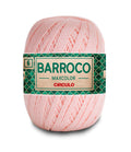 Hand holding Circulo Barroco Maxcolor Cotton Yarn skein.