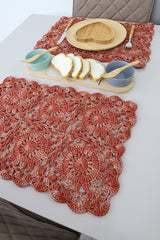 Circulo Barroco Multicolor Premium 4/6 - Brazilian Cotton Yarn, 226m/200g - A set of handmade crocheted table runners in a terracotta rust color, styled on a white dining table with a wooden heart-shaped plate, bowls, and sliced bread.