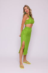 Circulo ANNE - 100% mercerized Cotton Yarn, 500m / 147g - Woman wearing a green crochet outfit on a white background