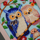Close-up of Happy Family beaded tapestry